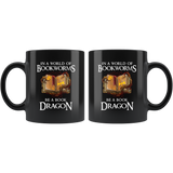 In A World Of Bookworms Be A Book Dragon 11oz Black Mug