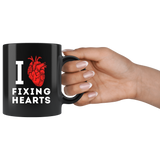I Love Fixing Hearts 11oz Black Mug