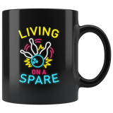 Living On A Spare 11oz Black Mug