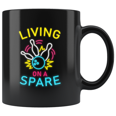 Living On A Spare 11oz Black Mug