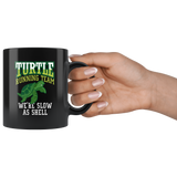 Turtle Running Team. We're Slow As Shell 11oz Black Mug