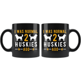 I Was Normal 2 Huskies Ago 11oz Black Mug